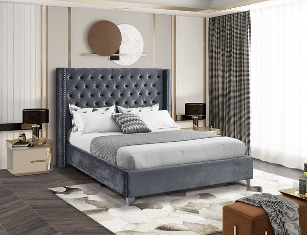 Winged bed with tufting in gray velvet fabric