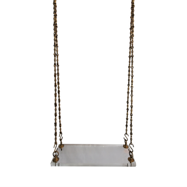 Lucite swing with brass hardware by Luxe Furniture palm beach