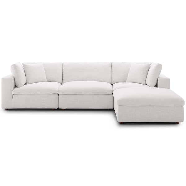 On a cloud sectional sofa with feather and down filled cushions in cream linen fabric