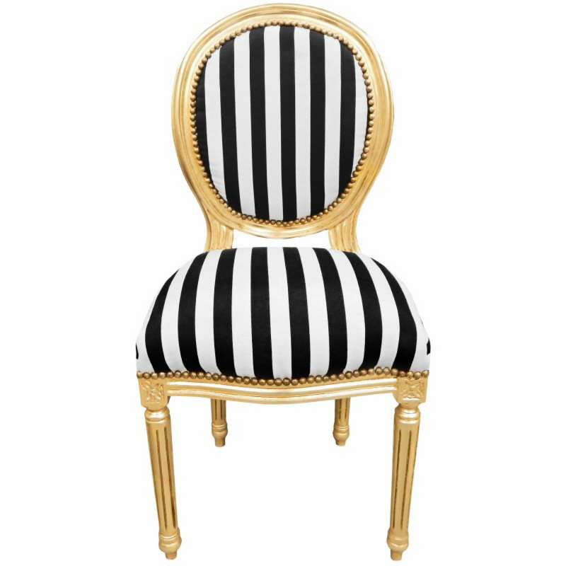 A classic French style chair with a gold frame and black and white striped upholstery, featuring nailhead trim.