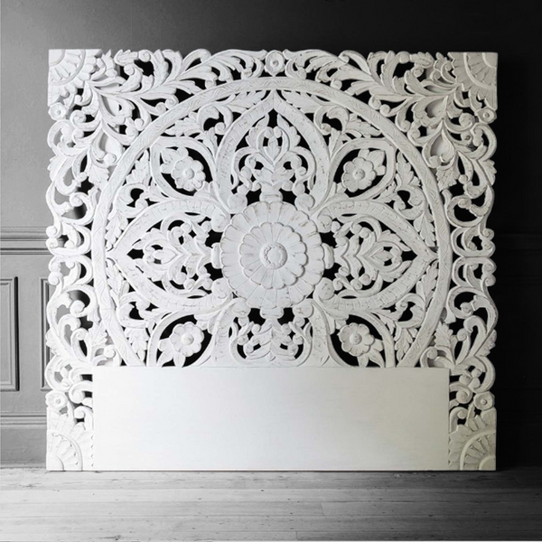 White hand carved wooden headboard