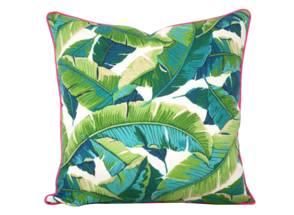 swaying palm print pillow with pink piping