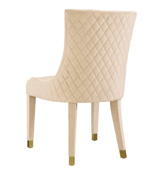 Cream velvet dining chair with diamond tufted upholstery
